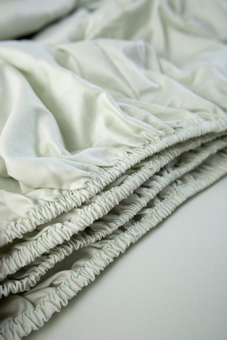 Set Bluee Bed Linen Neatly Pile Two Pillows Pillowcases Sheet Minimali by Orient Uniforms for customers in Dubai, Abu Dhabi, Sharjah, Ajman and across the UAE