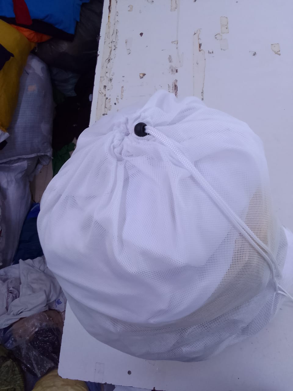 Mesh Material Draw String Stopper by Orient Uniforms for customers in Dubai, Abu Dhabi, Sharjah, Ajman and across the UAE