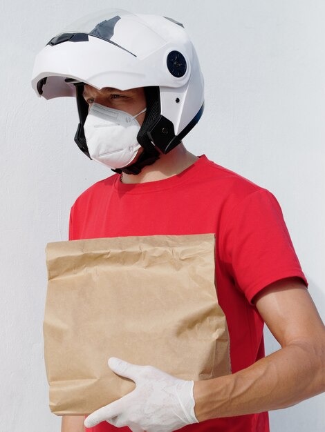 103 Motorcyclist Delivery Holds Cardboard Medical